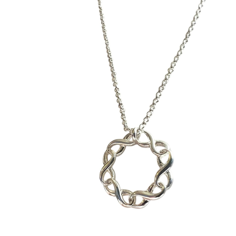 Avon x Saq Silver Tone Empowerment Circle Necklace - 2011